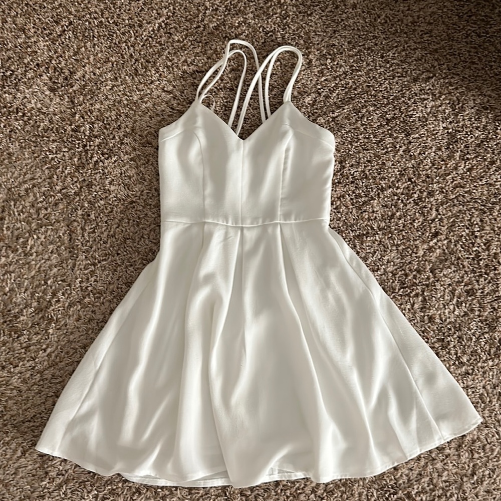White mini dress. Fully lined.